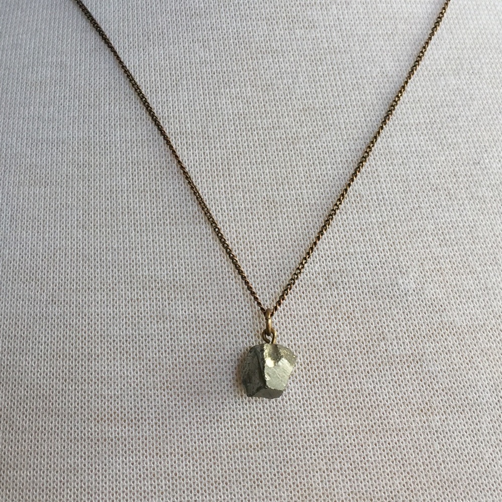 Gold rock pendant necklace